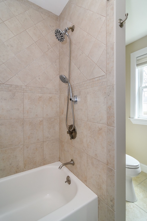 3 Leighton Street Natick, MA 01760 - Photo 21 of 31 a bathroom with a sink a toilet and shower
