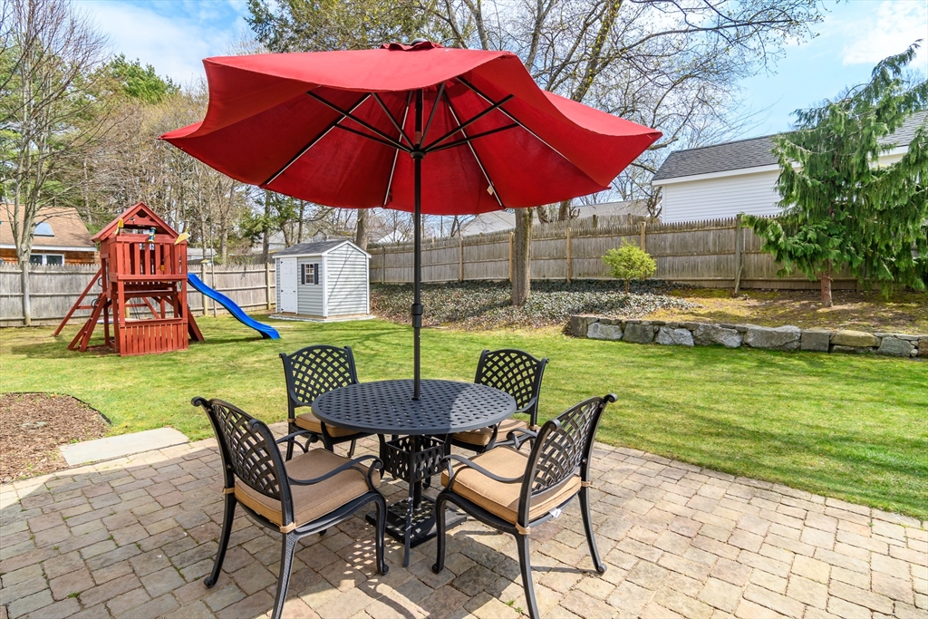 3 Leighton Street Natick, MA 01760 - Photo 26 of 31 a view of a table and chairs in the yard