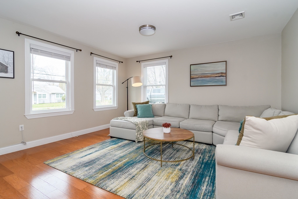 3 Leighton Street Natick, MA 01760 - Photo 10 of 31 a living room with furniture and a window