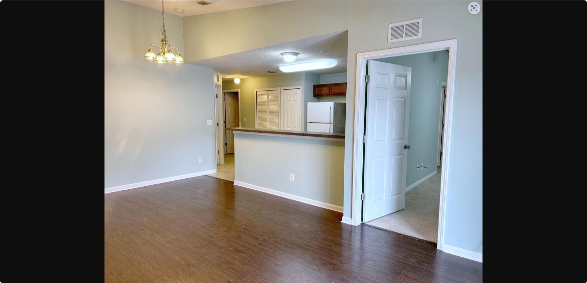 240 Golden Lake Loop St. Augustine, FL 32084 - Photo 18 of 19 a view of a hallway with wooden floor