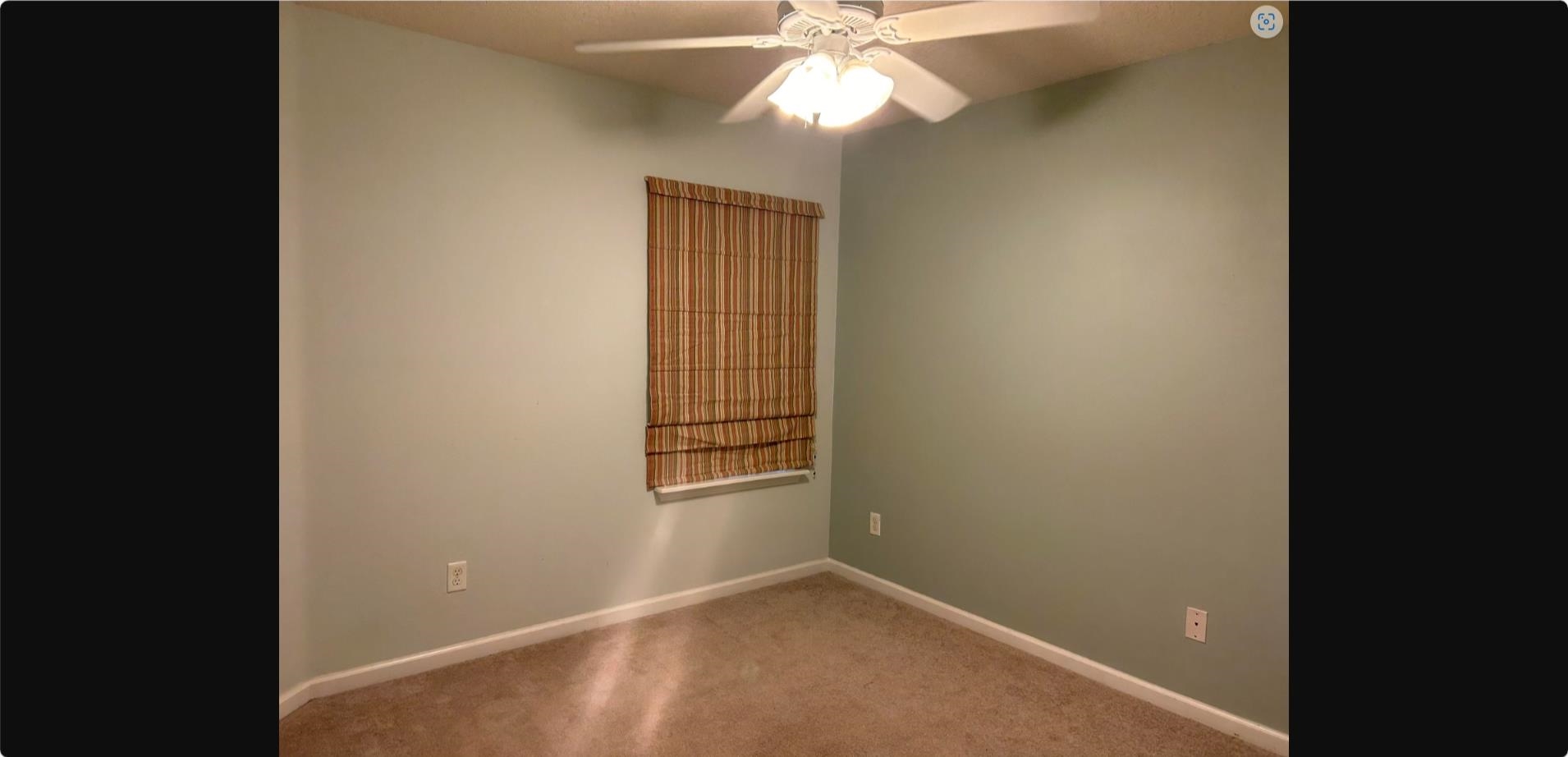 240 Golden Lake Loop St. Augustine, FL 32084 - Photo 9 of 19 an empty room with windows and fan