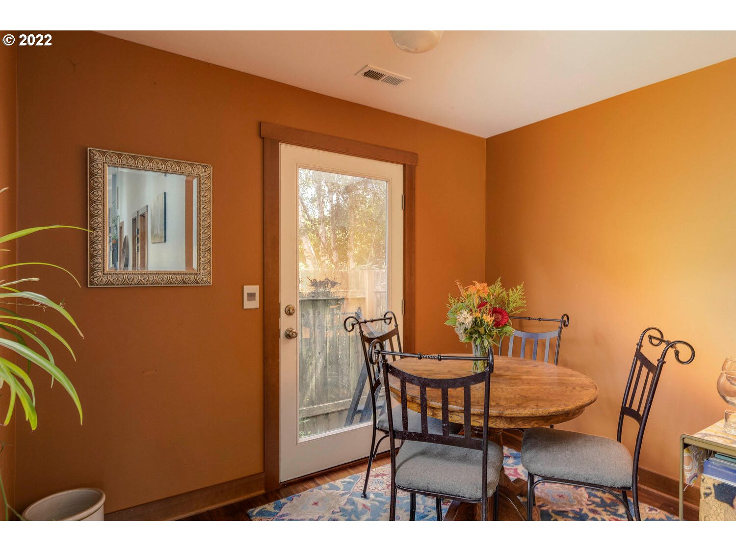 41584 Southeast Thomas Road Sandy, OR 97055 - Photo 11 of 32 a view of a dining room with furniture and wooden floor