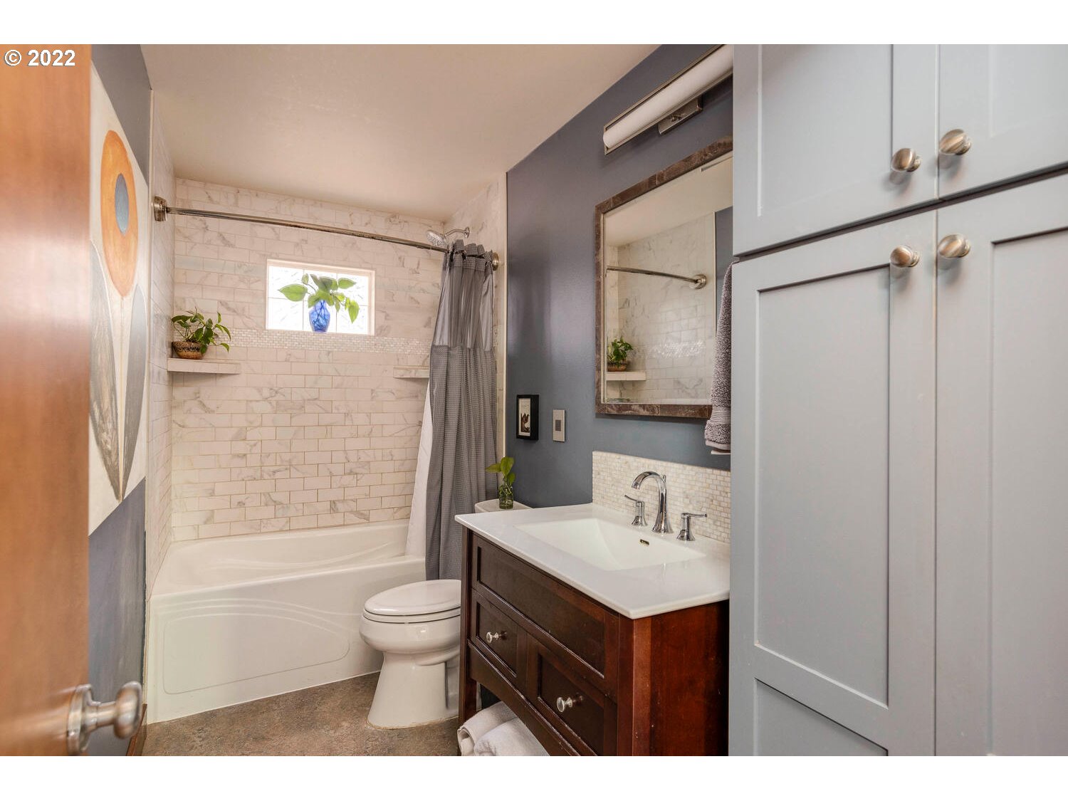 41584 Southeast Thomas Road Sandy, OR 97055 - Photo 13 of 32 a bathroom with a granite countertop sink toilet a mirror and shower