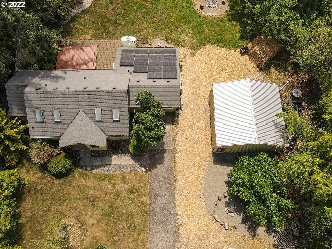 41584 Southeast Thomas Road Sandy, OR 97055 - Photo 26 of 32 an aerial view of a house with a yard and garden