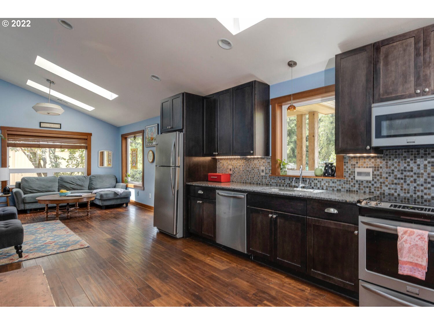 41584 Southeast Thomas Road Sandy, OR 97055 - Photo 10 of 32 a kitchen with sink cabinets and wooden floor