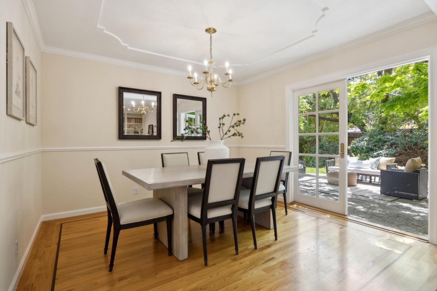 116 Vallecitos Way Los Gatos, CA 95032 - Photo 16 of 66 a view of a dining room with furniture a chandelier and wooden floor