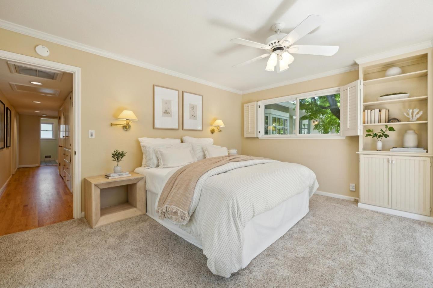 116 Vallecitos Way Los Gatos, CA 95032 - Photo 29 of 66 a bed room with a bed and a chandelier
