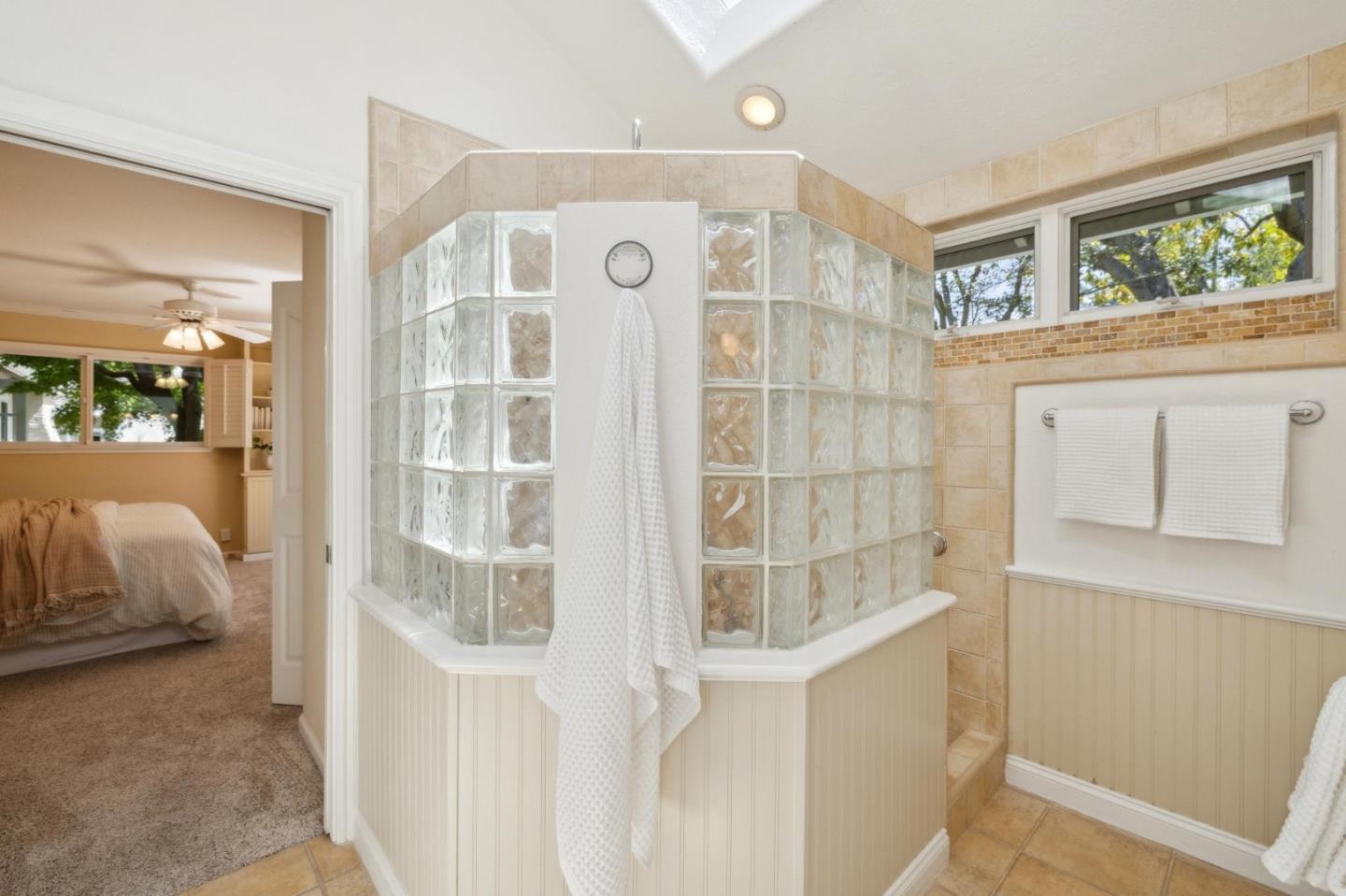 116 Vallecitos Way Los Gatos, CA 95032 - Photo 35 of 66 a view of walk in closet with clothes and shoes