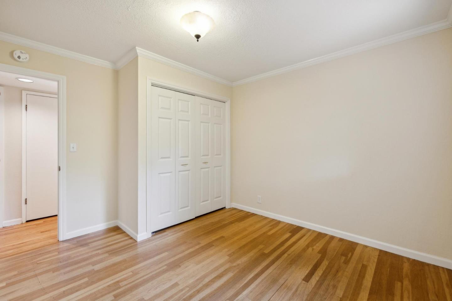 116 Vallecitos Way Los Gatos, CA 95032 - Photo 40 of 66 a view of an empty room with wooden floor