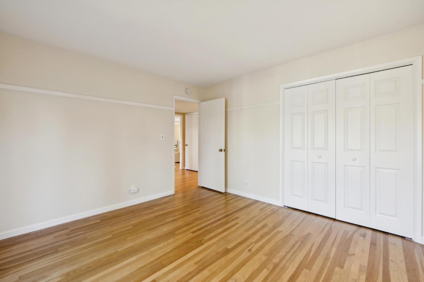 116 Vallecitos Way Los Gatos, CA 95032 - Photo 42 of 66 a view of an empty room with wooden floor