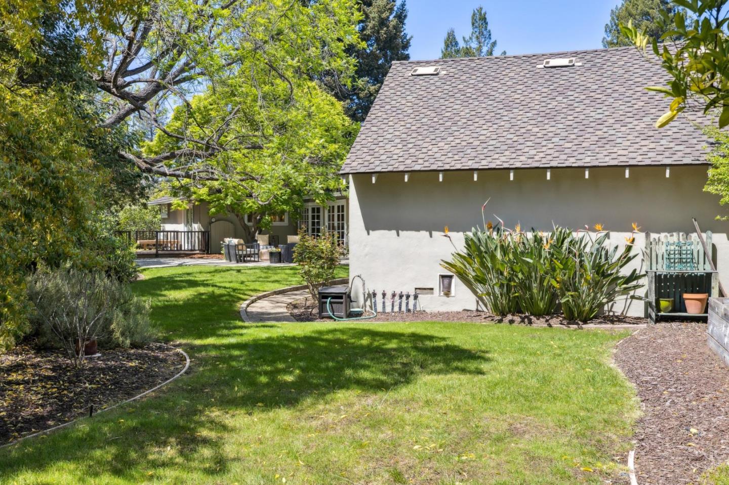116 Vallecitos Way Los Gatos, CA 95032 - Photo 54 of 66 a front view of a house with garden