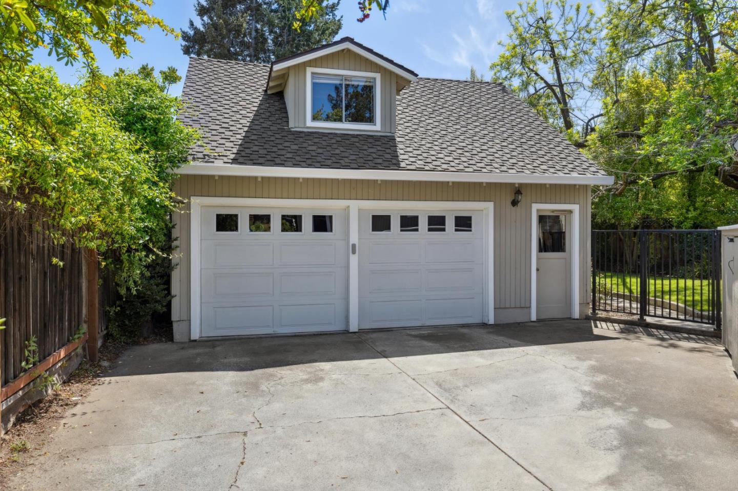 116 Vallecitos Way Los Gatos, CA 95032 - Photo 59 of 66 a front view of a house with a garage