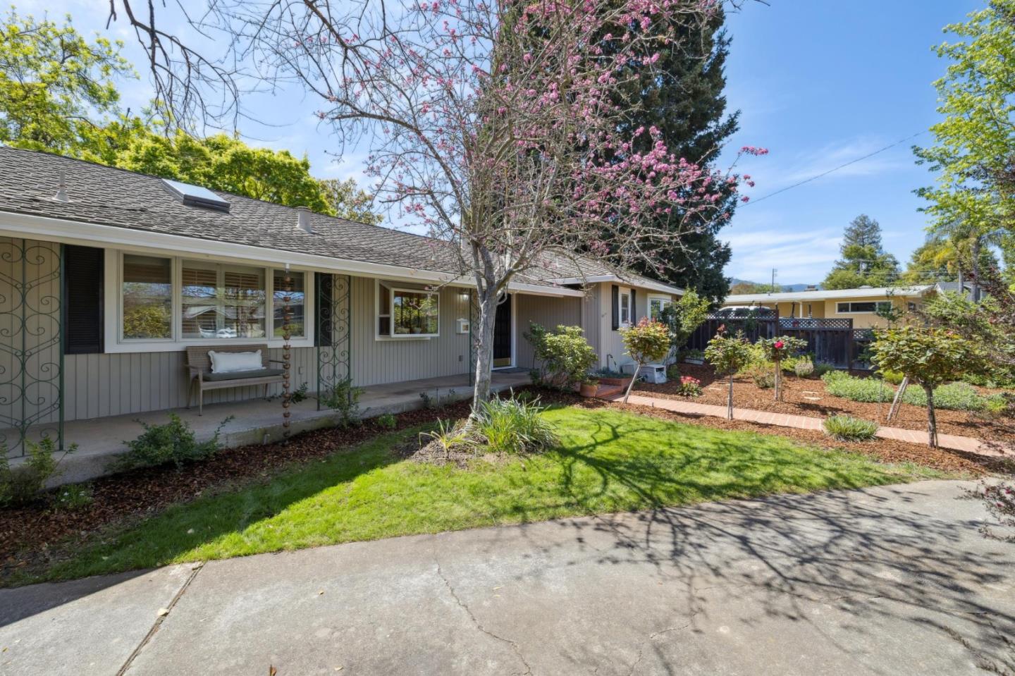 116 Vallecitos Way Los Gatos, CA 95032 - Photo 62 of 66 a view of a chair and table in backyard of the house