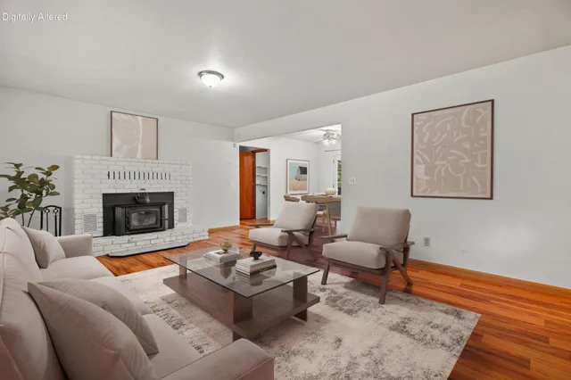 a view of kitchen with wooden floor and window