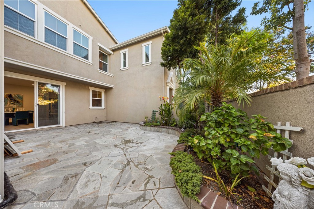 15525 Bonsai Way Tustin, CA 92782 - Photo 26 of 40 a view of a house with a yard and plant