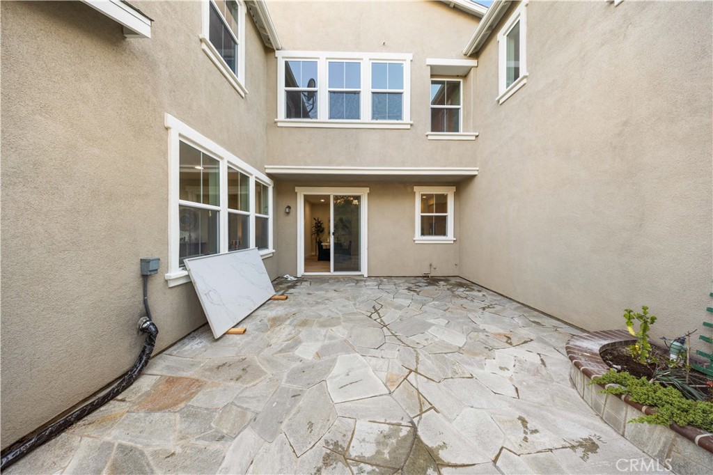 15525 Bonsai Way Tustin, CA 92782 - Photo 27 of 40 a view of a house with backyard