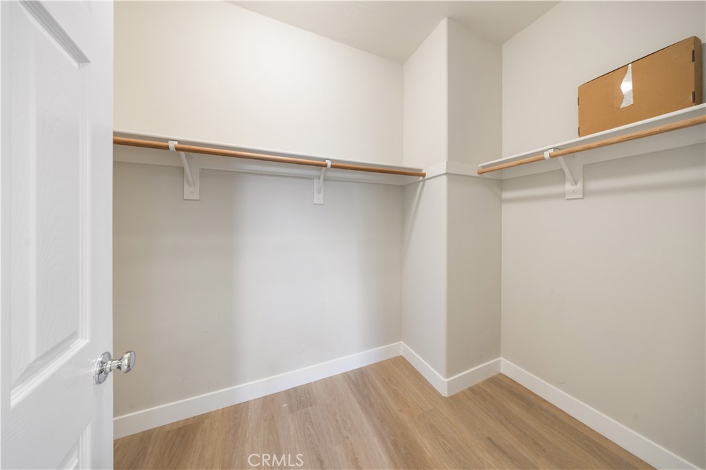 15525 Bonsai Way Tustin, CA 92782 - Photo 34 of 40 a view of an empty walk in closet