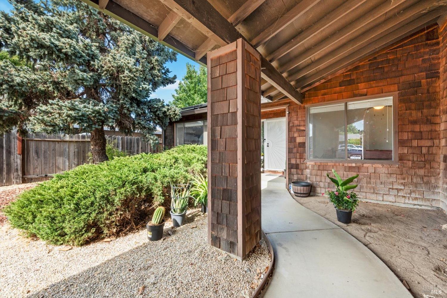 320 Serrano Court Fairfield, CA 94533 - Photo 1 of 1 a view of a porch with furniture and garden