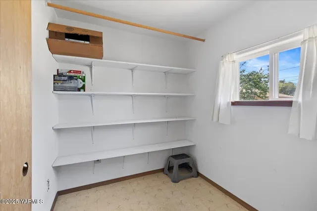 a view of room with shelves