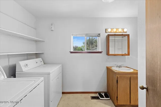a utility room with dryer and washer