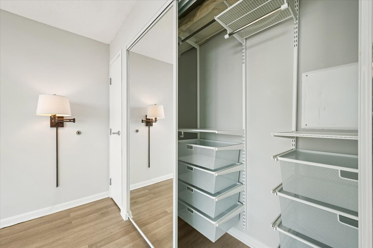 800 Elgin Road, Unit 1013 Evanston, IL 60201 - Photo 13 of 25 a bathroom with a shower and a sink