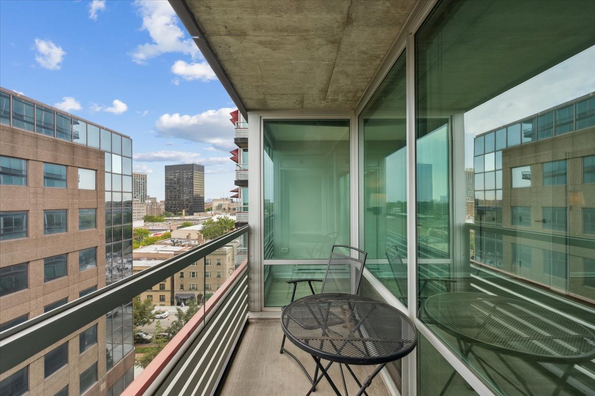 800 Elgin Road, Unit 1013 Evanston, IL 60201 - Photo 19 of 25 a view of balcony with a potted plant