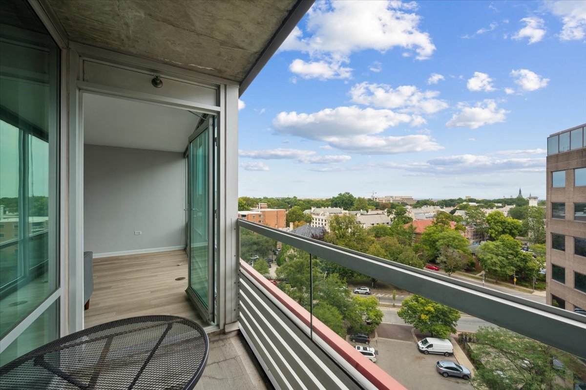 800 Elgin Road, Unit 1013 Evanston, IL 60201 - Photo 20 of 25 a view of a balcony with chair