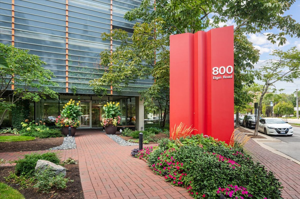 800 Elgin Road, Unit 1013 Evanston, IL 60201 - Photo 2 of 25 a view of a building with flowers and flowers