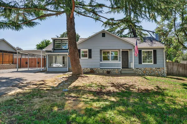 a house with yard in front of it