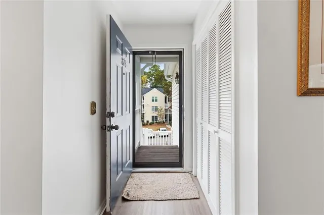 a living room with fireplace furniture and a flat screen tv