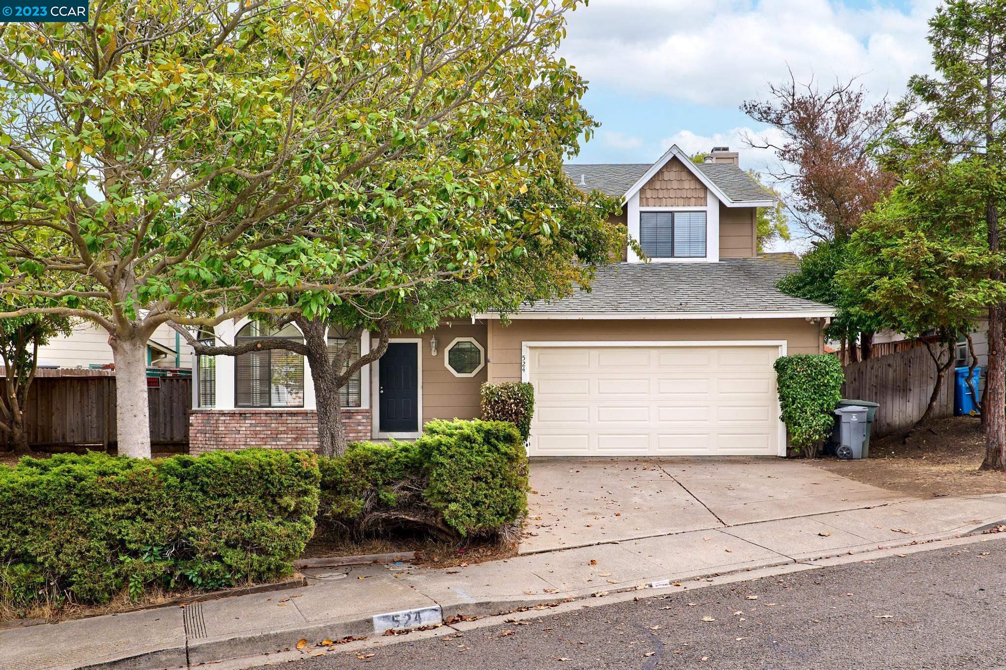 524 Topsail Drive Vallejo, CA 94591 - Photo 1 of 1 a front view of a house with a garden