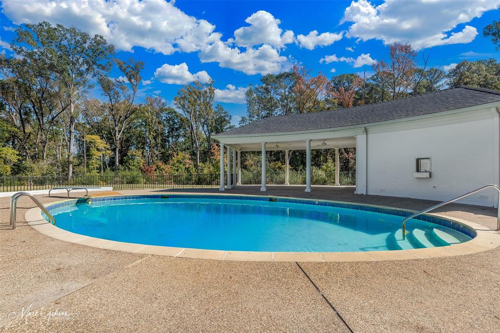 10405 Ellerbe Road Shreveport, LA 71106 - Photo 22 of 40 a view of swimming pool with outdoor seating