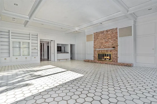 a view of livingroom with furniture and front door
