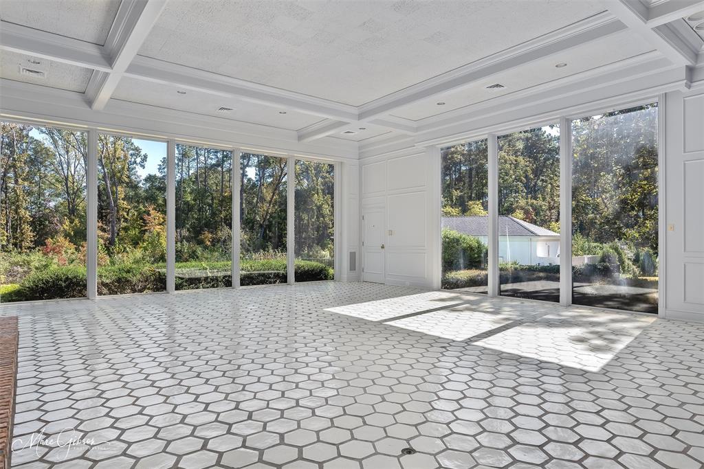 10405 Ellerbe Road Shreveport, LA 71106 - Photo 9 of 40 a view of a porch with chairs and yard