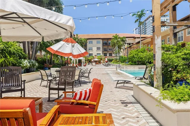 an outdoor space with patio furniture