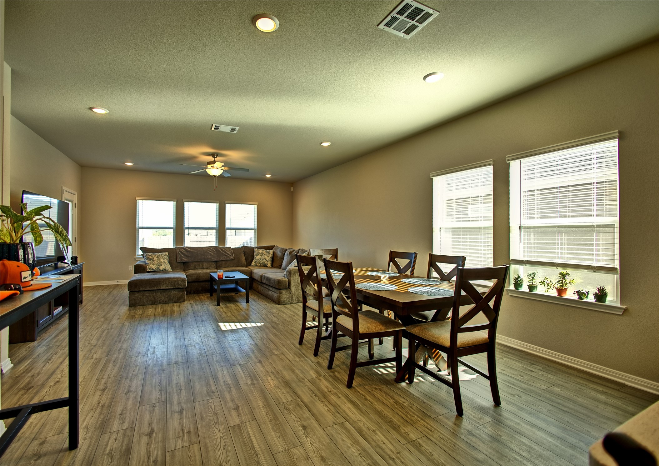 2809 Moyer Lane Round Rock, TX 78665 - Photo 4 of 22 Dining space featuring a ceiling fan, hardwood / wood-style floors, and recessed lighting
