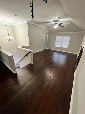 a view of a livingroom with wooden floor
