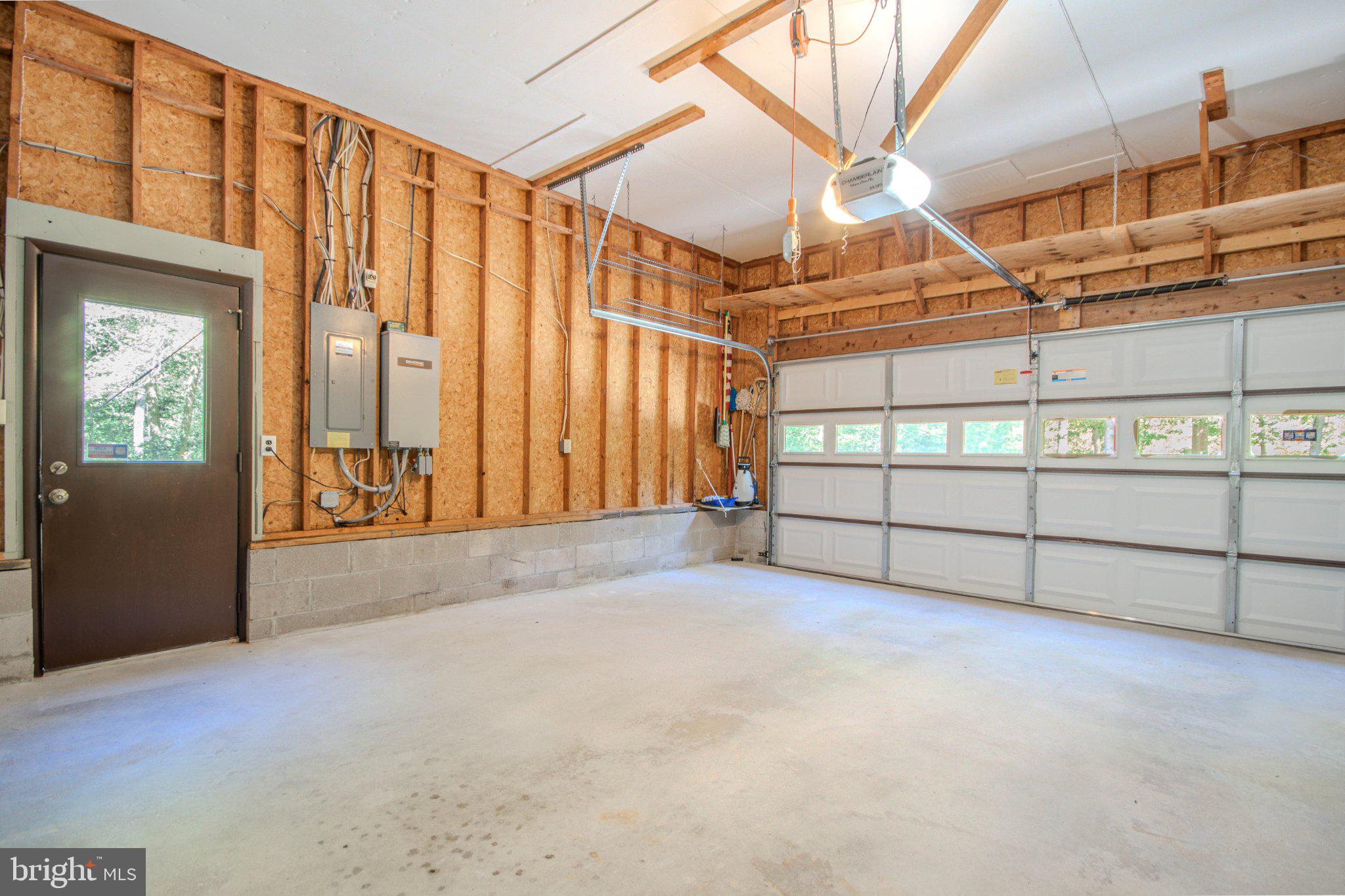 31749 Morris Leonard Road Parsonsburg, MD 21849 - Photo 25 of 40 Spacious garage with natural light.