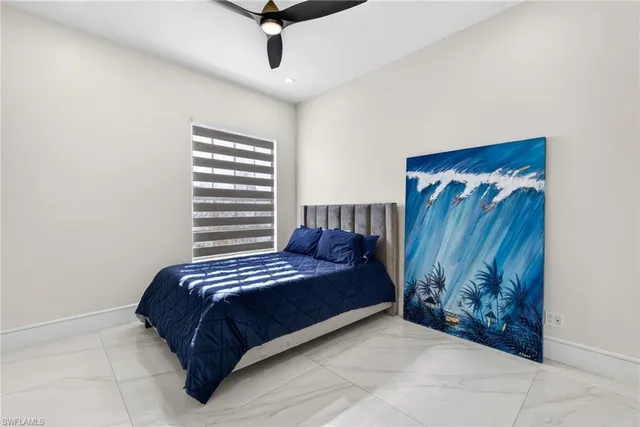 a bedroom with a bed and a walk in closet