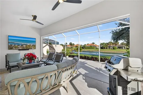 a patio with yard table and chairs
