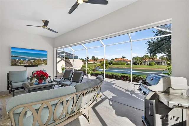 a patio with yard table and chairs