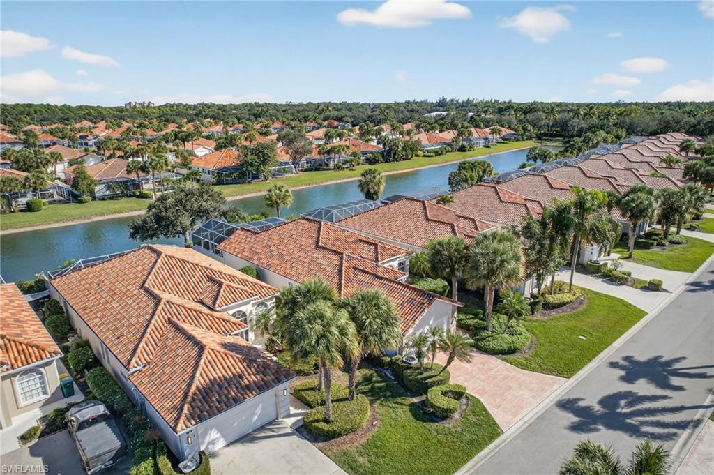 3956 Isla Ciudad Court Naples, FL 34109 - Photo 39 of 39 Aerial view of residential area with a large body of water