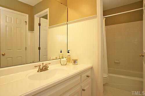Both full baths have been remodeled w/ beadboard walls and heavy ledge, tiled floors, tile surround baths, brand new fixtures & lighting, neutral paint, one piece marble vanities.