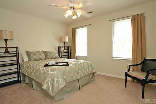 405 Maylands Avenue Raleigh, NC 27615 - Photo 8 of 10 Second & Third bedrooms are also roomy w/ nice sized closets, 6 panel doors, ceiling fans, plush neutral carpet, plenty of windows and great views!