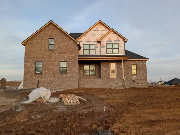 a house view with a garden space