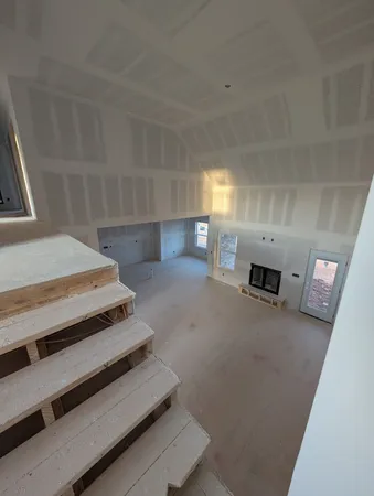 a living room with furniture and a couch