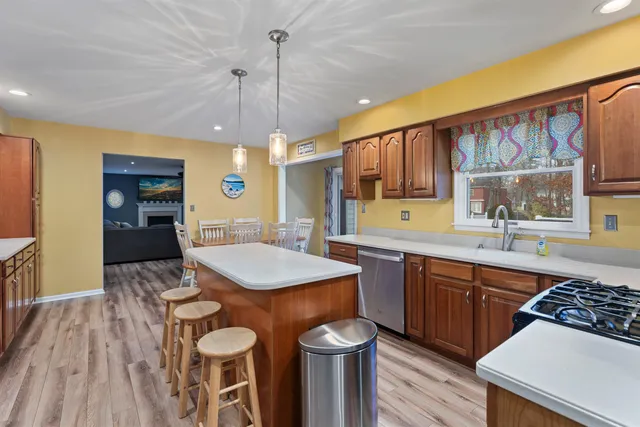 a kitchen with a table and chairs