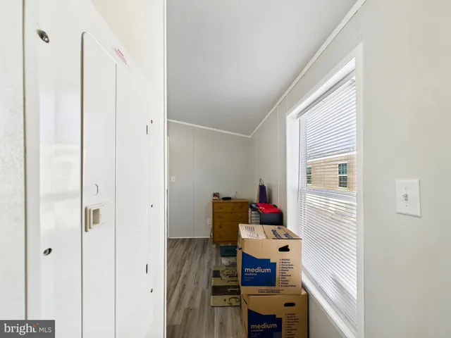 a room with a bed and furniture