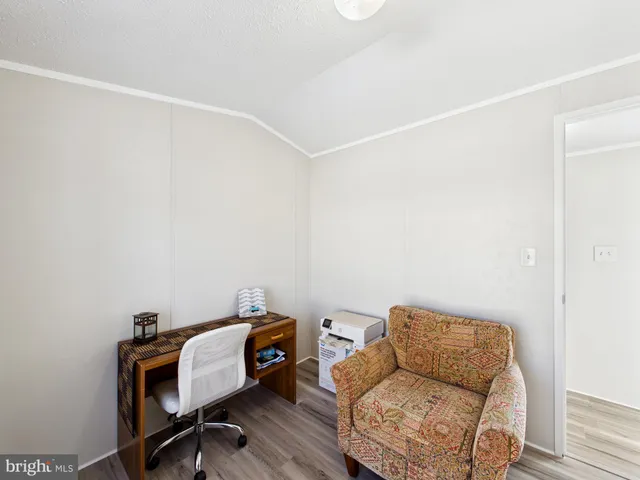 a view of workspace with lounge chair