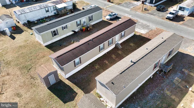 a view of living room with furniture and flat screen tv